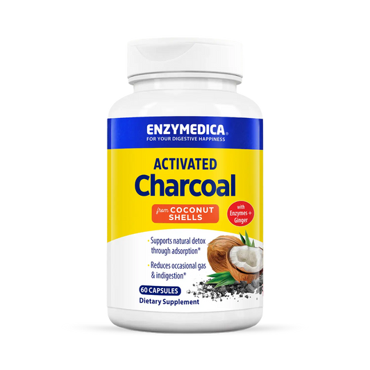 A bottle of Enzymedica Activated Charcoal dietary supplement, with an illustration of a coconut on the label, indicating it is made from coconut shells.